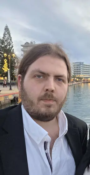 Photograph of Alex looking sharp