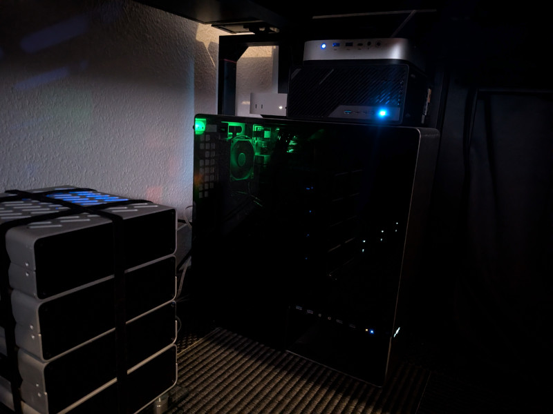 Photograph of computers underneath Alex's desk